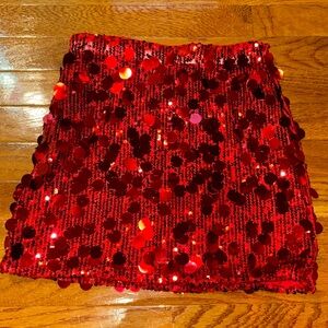 Red sequined mini skirt, sparkly good condition never worn
